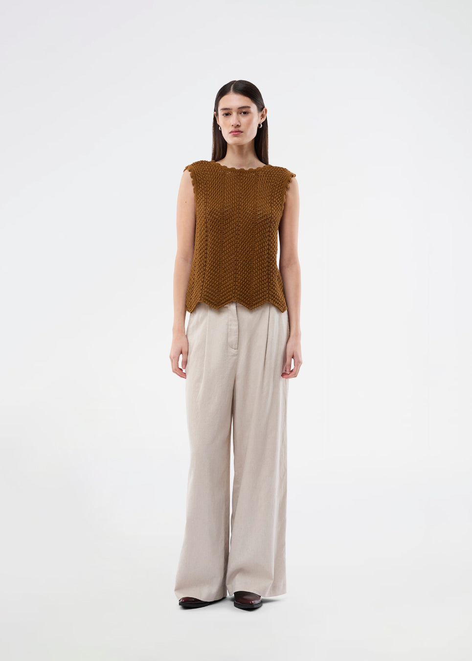 Crochet top without sleeves in a multicolored organic cotton. CaryMD top has detailed trimmings and a deep v-neckline in the back. 