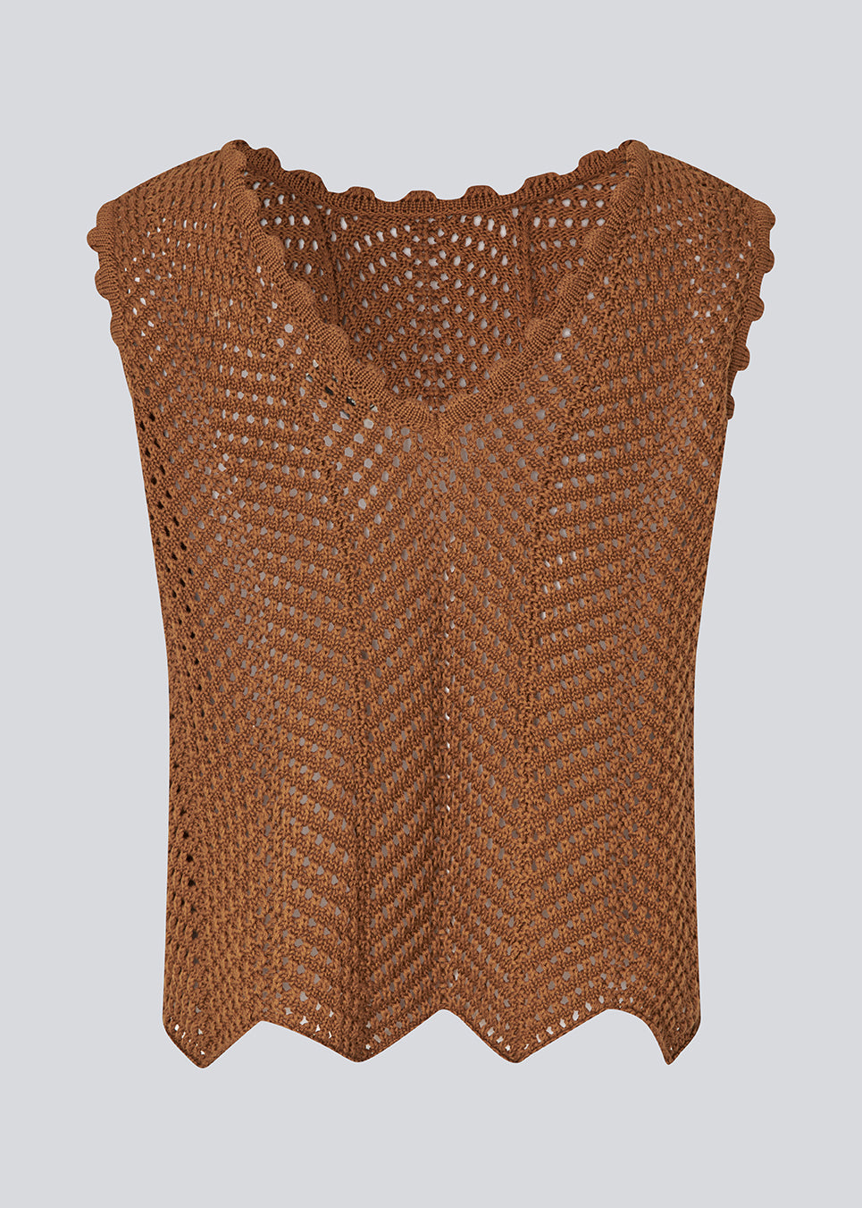 Crochet top without sleeves in a multicolored organic cotton. CaryMD top has detailed trimmings and a deep v-neckline in the back. 
