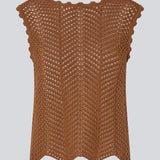 Crochet top without sleeves in a multicolored organic cotton. CaryMD top has detailed trimmings and a deep v-neckline in the back. 