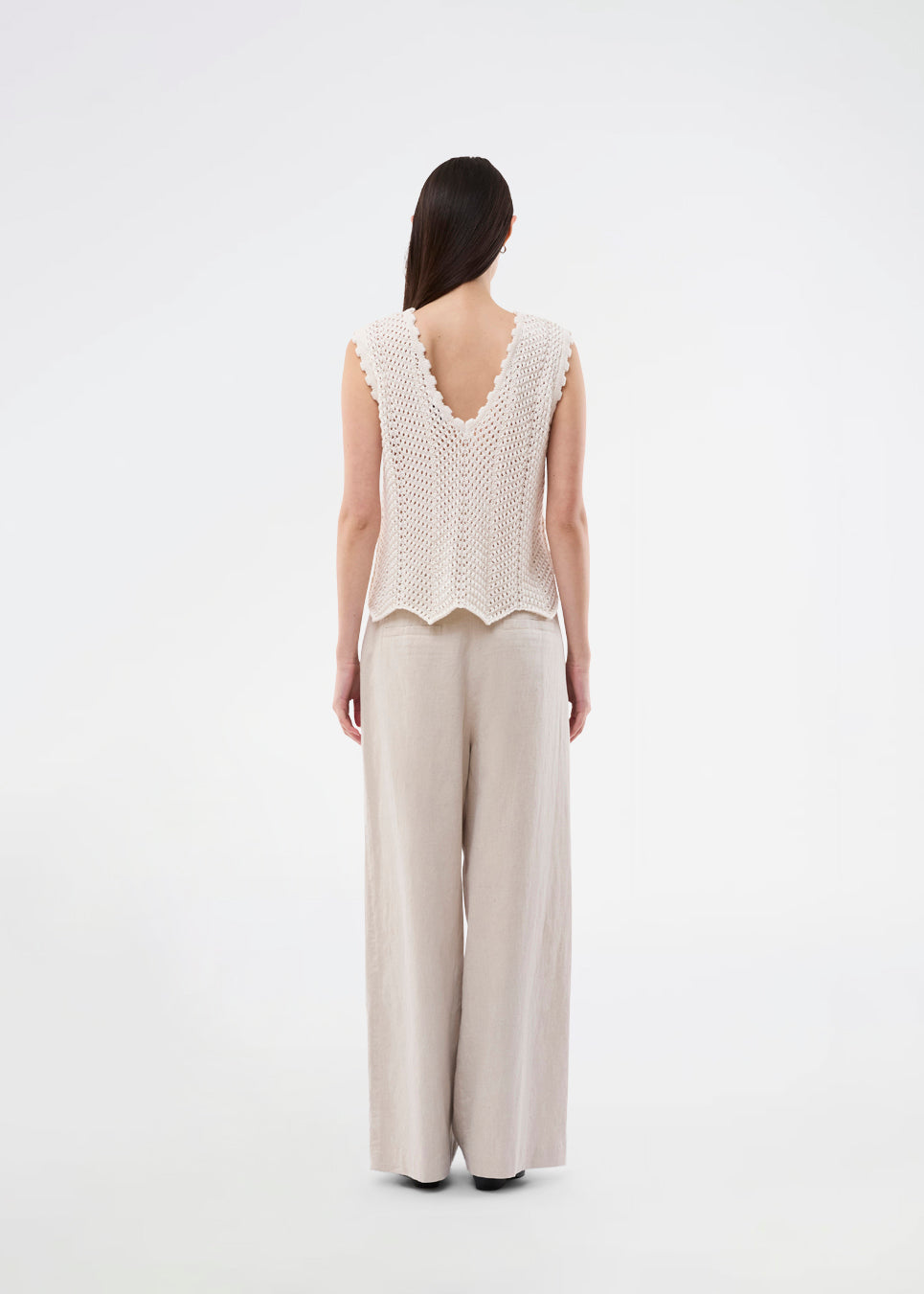 Crochet top without sleeves in a multicolored organic cotton. CaryMD top has detailed trimmings and a deep v-neckline in the back. 