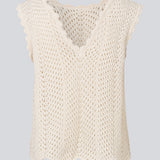 Crochet top without sleeves in a multicolored organic cotton. CaryMD top has detailed trimmings and a deep v-neckline in the back. 