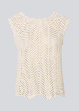 Crochet top without sleeves in a multicolored organic cotton. CaryMD top has detailed trimmings and a deep v-neckline in the back. 