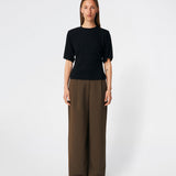 Classic T-shirt crafted from a soft and comfortable fabric. Ciliane T-shirt features a gently fitted silhouette with a crew neckline, short sleeves, and built-in shoulder pads that create a modern, structured look. Its clean, timeless design makes it a versatile wardrobe essential, perfect to wear on its own or layered under jackets, knitwear, and blazers.
