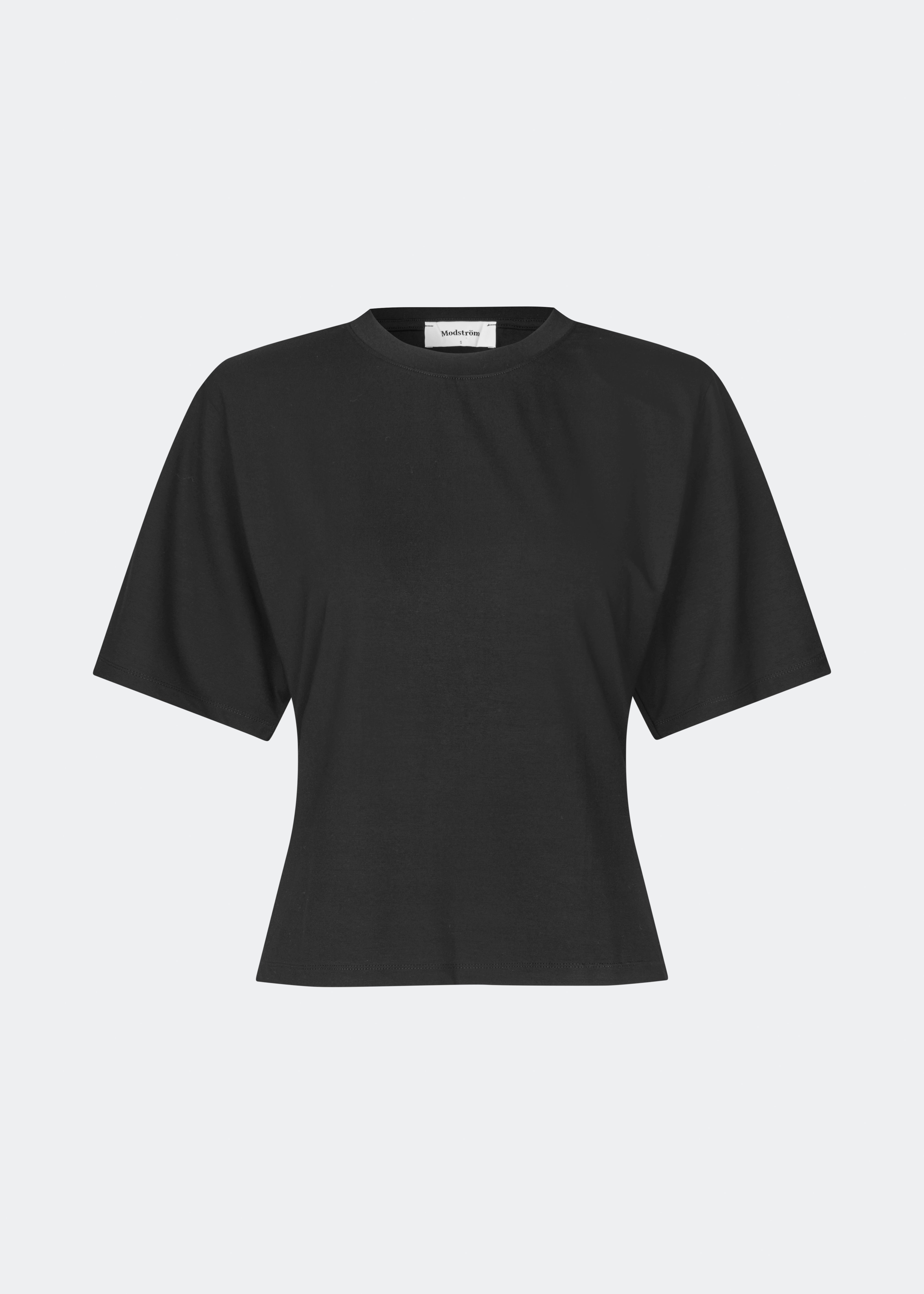 Classic T-shirt crafted from a soft and comfortable fabric. Ciliane T-shirt features a gently fitted silhouette with a crew neckline, short sleeves, and built-in shoulder pads that create a modern, structured look. Its clean, timeless design makes it a versatile wardrobe essential, perfect to wear on its own or layered under jackets, knitwear, and blazers.
