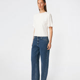 Classic T-shirt crafted from a soft and comfortable fabric. Ciliane T-shirt features a gently fitted silhouette with a crew neckline, short sleeves, and built-in shoulder pads that create a modern, structured look. Its clean, timeless design makes it a versatile wardrobe essential, perfect to wear on its own or layered under jackets, knitwear, and blazers.