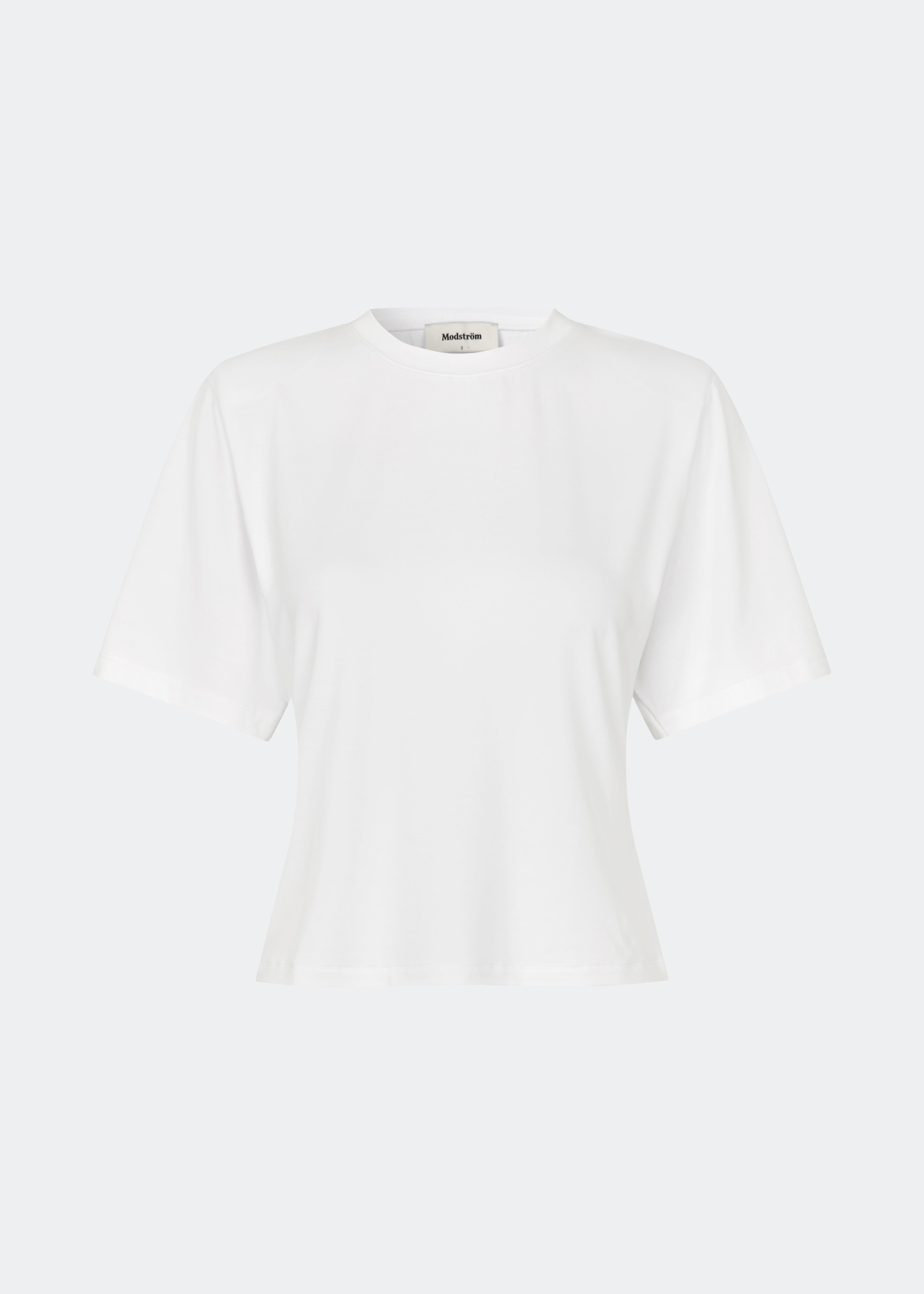 Classic T-shirt crafted from a soft and comfortable fabric. Ciliane T-shirt features a gently fitted silhouette with a crew neckline, short sleeves, and built-in shoulder pads that create a modern, structured look. Its clean, timeless design makes it a versatile wardrobe essential, perfect to wear on its own or layered under jackets, knitwear, and blazers.