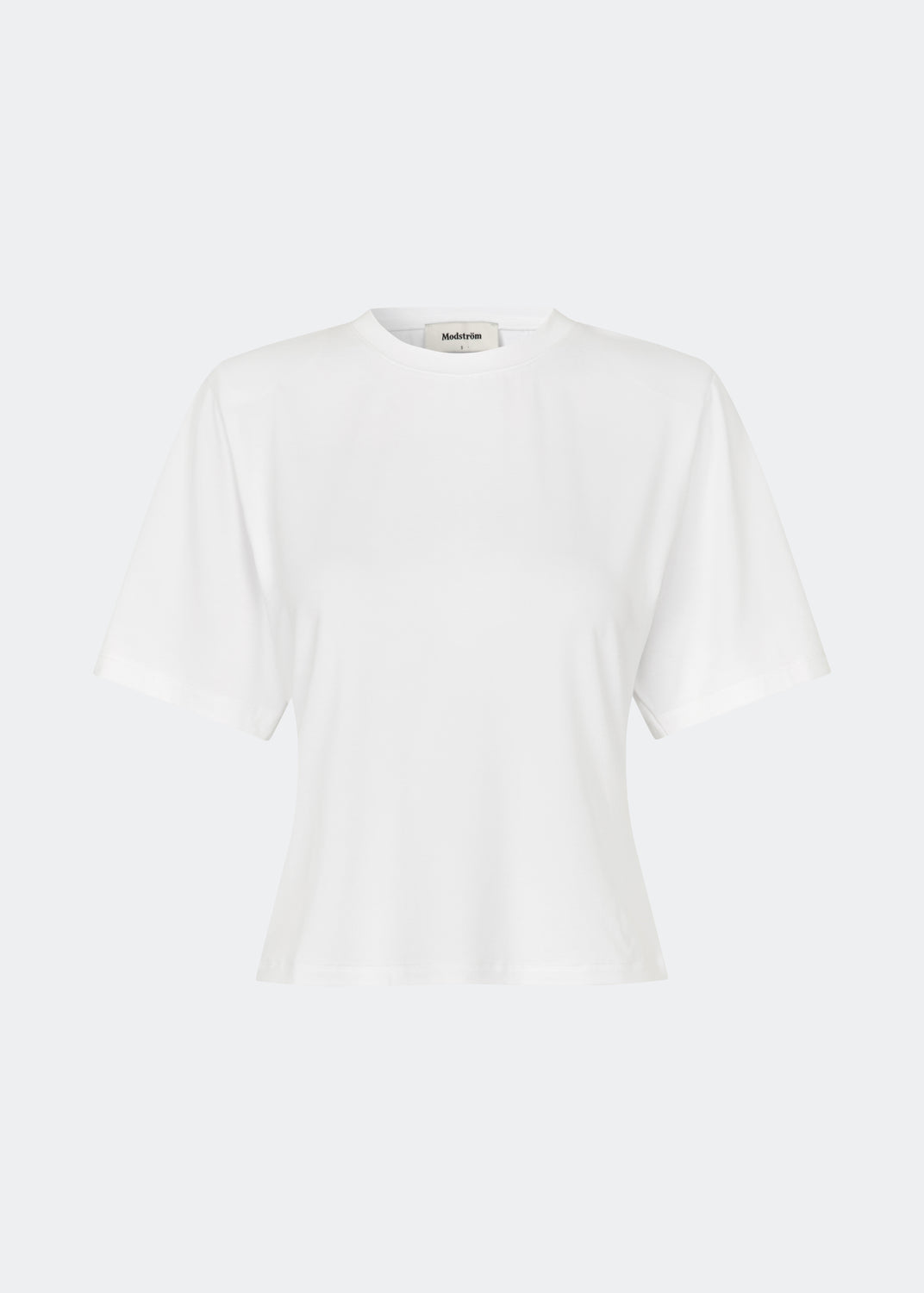 Classic T-shirt crafted from a soft and comfortable fabric. Ciliane T-shirt features a gently fitted silhouette with a crew neckline, short sleeves, and built-in shoulder pads that create a modern, structured look. Its clean, timeless design makes it a versatile wardrobe essential, perfect to wear on its own or layered under jackets, knitwear, and blazers.
