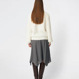 Soft and feminine knitted sweater with delicate crochet detailing. Cillamd V-neck is designed in a relaxed fit with a V-neckline, wide collar, and decorative crochet panels across the shoulders for a romantic touch. The voluminous sleeves and soft knit quality make it a comfortable wardrobe favourite that pairs effortlessly with jeans, tailored trousers, and skirts.