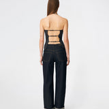 Elegant halterneck top with a modern look. Cirkelinemd top is made from 80% recycled polyester and designed with a flattering fit, a halterneck neckline, and a striking open back with adjustable straps. The feminine silhouette makes it perfect for both special occasions and elevated everyday styling.