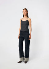 Elegant halterneck top with a modern look. Cirkelinemd top is made from 80% recycled polyester and designed with a flattering fit, a halterneck neckline, and a striking open back with adjustable straps. The feminine silhouette makes it perfect for both special occasions and elevated everyday styling.