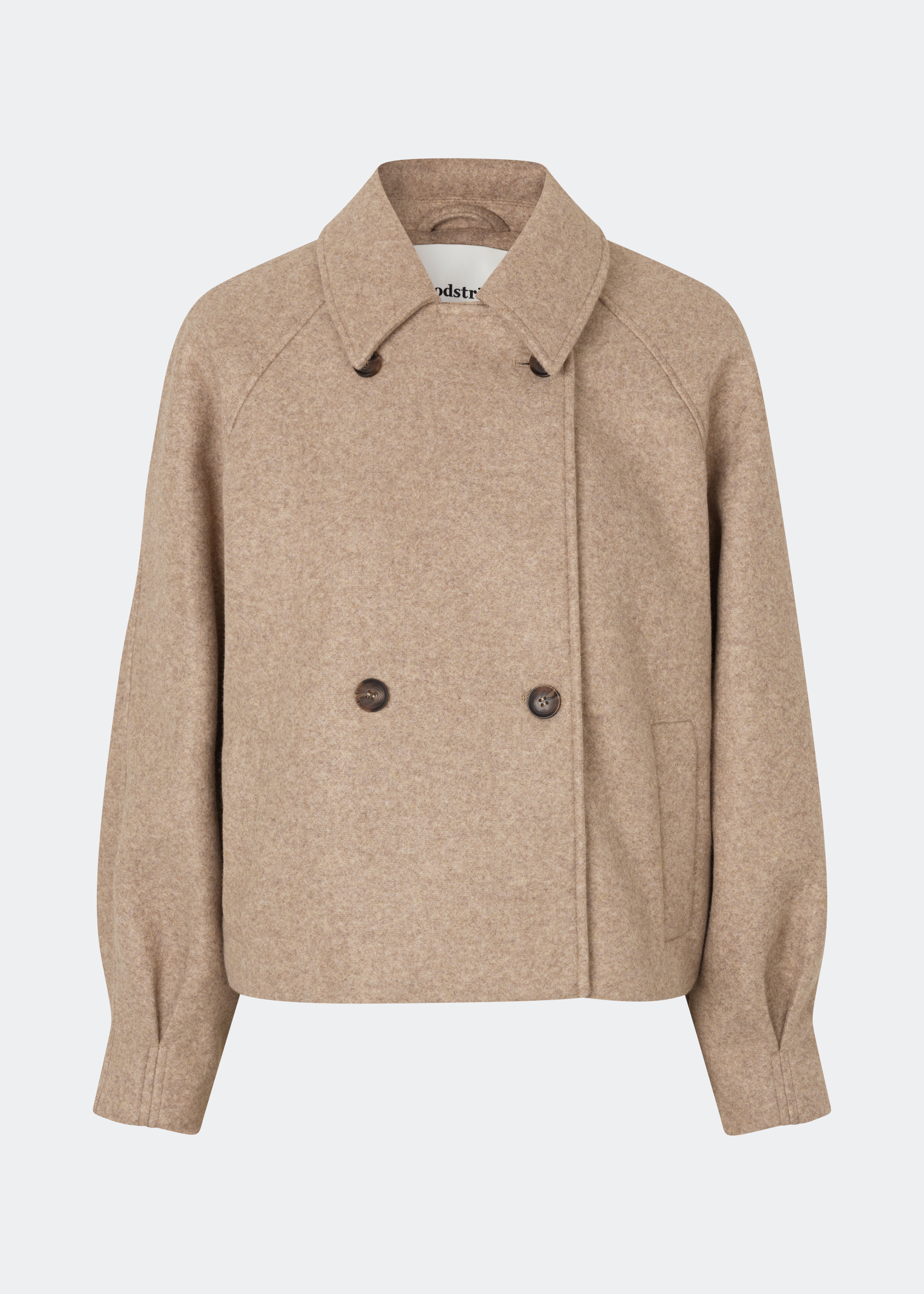 Short jacket with a timeless, sophisticated aesthetic. Cleamd jacket features a relaxed, slightly boxy silhouette with a double-breasted button closure, classic collar, and raglan sleeves for a soft and comfortable fit. Discreet side pockets and clean lines enhance the minimalist design, while the cropped length makes it perfect for both everyday wear and more polished looks.
