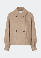 Short jacket with a timeless, sophisticated aesthetic. Cleamd jacket features a relaxed, slightly boxy silhouette with a double-breasted button closure, classic collar, and raglan sleeves for a soft and comfortable fit. Discreet side pockets and clean lines enhance the minimalist design, while the cropped length makes it perfect for both everyday wear and more polished looks.