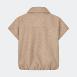 Short vest with a modern, relaxed aesthetic. Cleamd vest features a boxy silhouette with short, wide sleeves, a classic collar, and snap button closure at the front. Discreet front pockets and an elasticated hem create a soft, rounded shape and a comfortable fit. Perfect for layering over knitwear, shirts, or dresses during the transitional seasons.