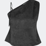 Asymmetric top with a modern and elegant look. Clemensmd top is crafted from a textured fabric with a subtle crinkle finish, adding depth and character. Designed with a one-shoulder silhouette, it features a slim adjustable shoulder strap on one side and a softly fitted shape that flatters the body. A refined statement piece, perfect for special occasions and elevated evening styling.