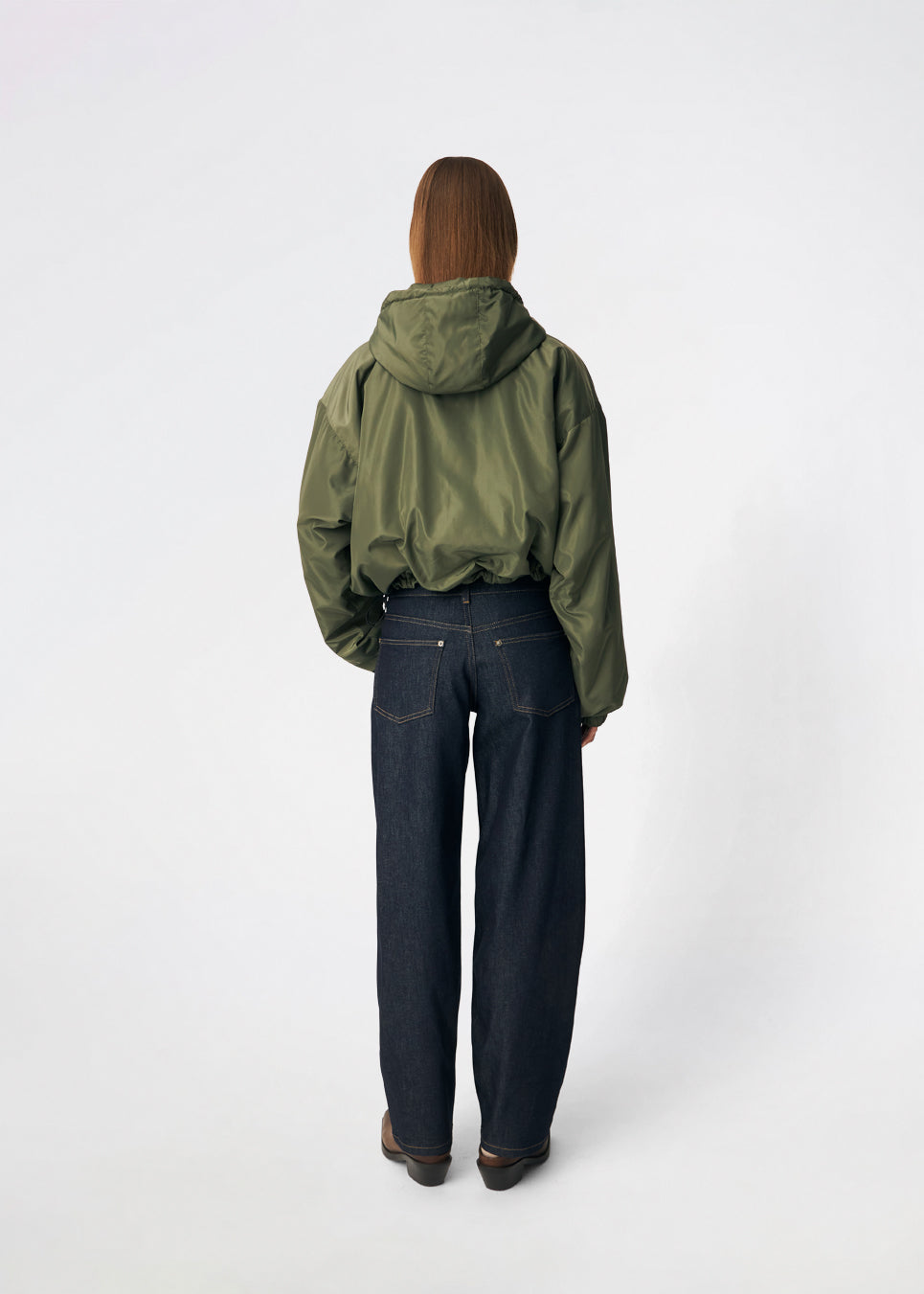 ConnieMD Jacket is a short jacket with a loose fit and hood. The jacket features a zip fastening at the front, large flap pockets and long, voluminous sleeves with elasticated cuffs. The model is 175 cm tall and is wearing a size S/36.