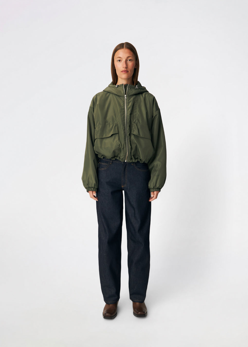 ConnieMD Jacket is a short jacket with a loose fit and hood. The jacket features a zip fastening at the front, large flap pockets and long, voluminous sleeves with elasticated cuffs. The model is 175 cm tall and is wearing a size S/36.