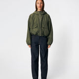 ConnieMD Jacket is a short jacket with a loose fit and hood. The jacket features a zip fastening at the front, large flap pockets and long, voluminous sleeves with elasticated cuffs. The model is 175 cm tall and is wearing a size S/36.