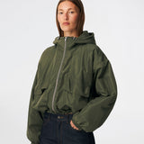 ConnieMD Jacket is a short jacket with a loose fit and hood. The jacket features a zip fastening at the front, large flap pockets and long, voluminous sleeves with elasticated cuffs. The model is 175 cm tall and is wearing a size S/36.