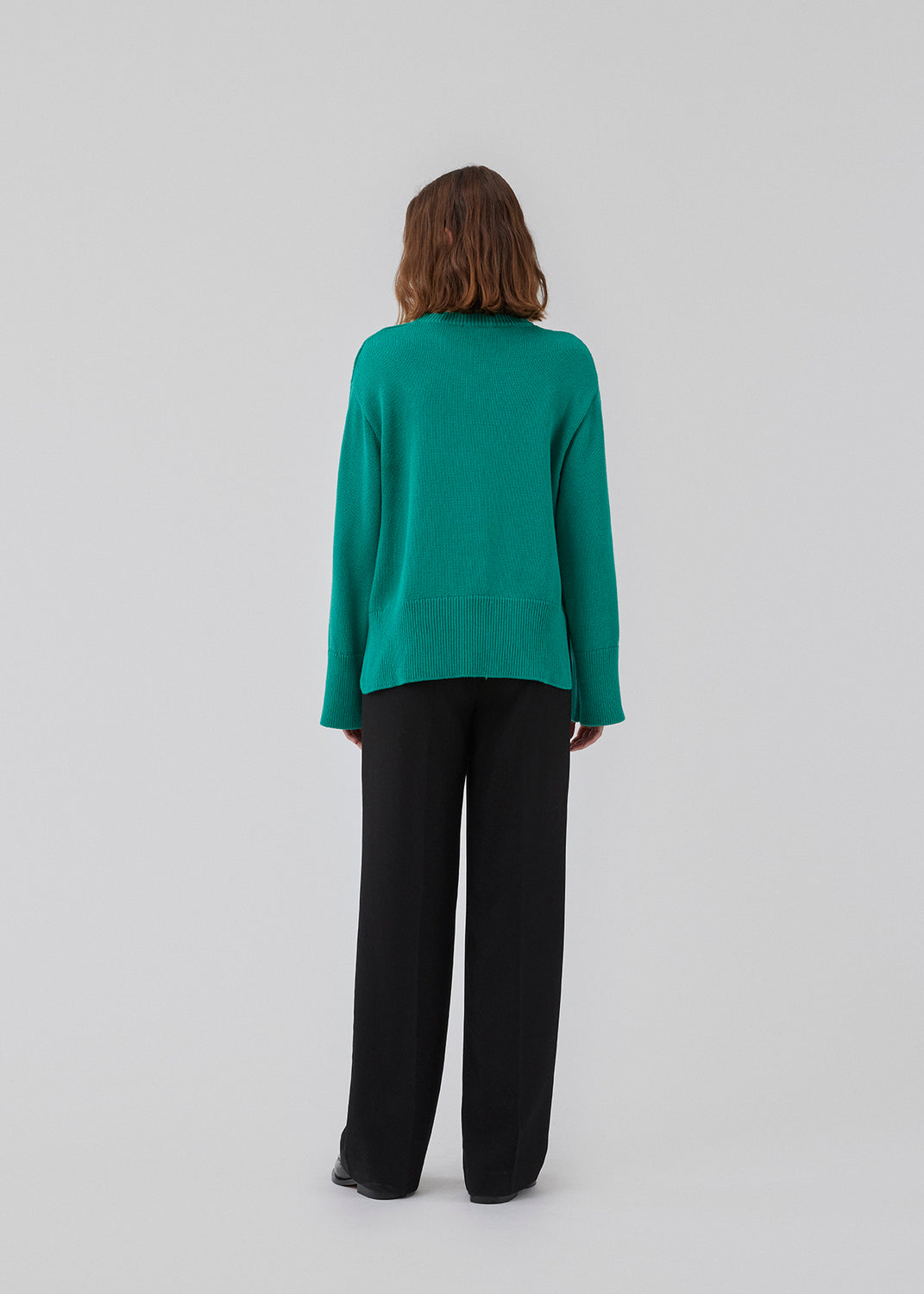 Fine-knitted oversize jumper knitted from cotton. CorbinMD o-neck has ribbed round neckline, long wide sleeves, and wide ribbing at cuffs and hem.