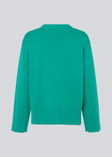 Fine-knitted oversize jumper knitted from cotton. CorbinMD o-neck has ribbed round neckline, long wide sleeves, and wide ribbing at cuffs and hem.