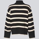 Fine-knitted oversized jumper knitted from cotton in black with beige stripes. CorbinMD stripe t-neck has a ribbed rollneck, long wide sleeves, and wide ribbing at cuffs and hem.  The model is 177 cm and wears a size S/36.