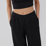 Fitted tube top in black in soft, rib-knitted cotton quality. DaeMD tube top has a sweetheart neckline with a silicone trim on the inside.