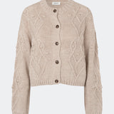 DahliaMD Cardigan is a short cardigan with a relaxed fit and round neckline. The design features a full button fastening, long sleeves and decorative knitted details at the front and along the sleeves. Style it with jeans or classic trousers for a relaxed everyday look. The model is 175 cm tall and is wearing a size S/36.