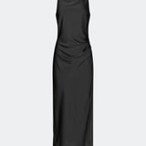 DanillaMD Dress is a long satin dress with an elegant, figure-hugging silhouette. The design features a straight neckline, thin straps and draped detailing at the side, creating a soft fall. The open back with delicate crossing straps adds a feminine touch. Style it with heels and simple accessories for special occasions. The model is 175 cm tall and is wearing a size S/36.