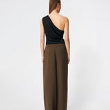 DanillaMD Top is an asymmetric satin top with a fitted silhouette and one shoulder. The design features soft draping and a tie detail at the side, creating a feminine finish while allowing the fit to be adjusted. Style it with tailored trousers or a long skirt for both everyday wear and special occasions. The model is 175 cm tall and is wearing a size S/36.
