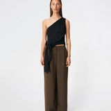 DanillaMD Top is an asymmetric satin top with a fitted silhouette and one shoulder. The design features soft draping and a tie detail at the side, creating a feminine finish while allowing the fit to be adjusted. Style it with tailored trousers or a long skirt for both everyday wear and special occasions. The model is 175 cm tall and is wearing a size S/36.