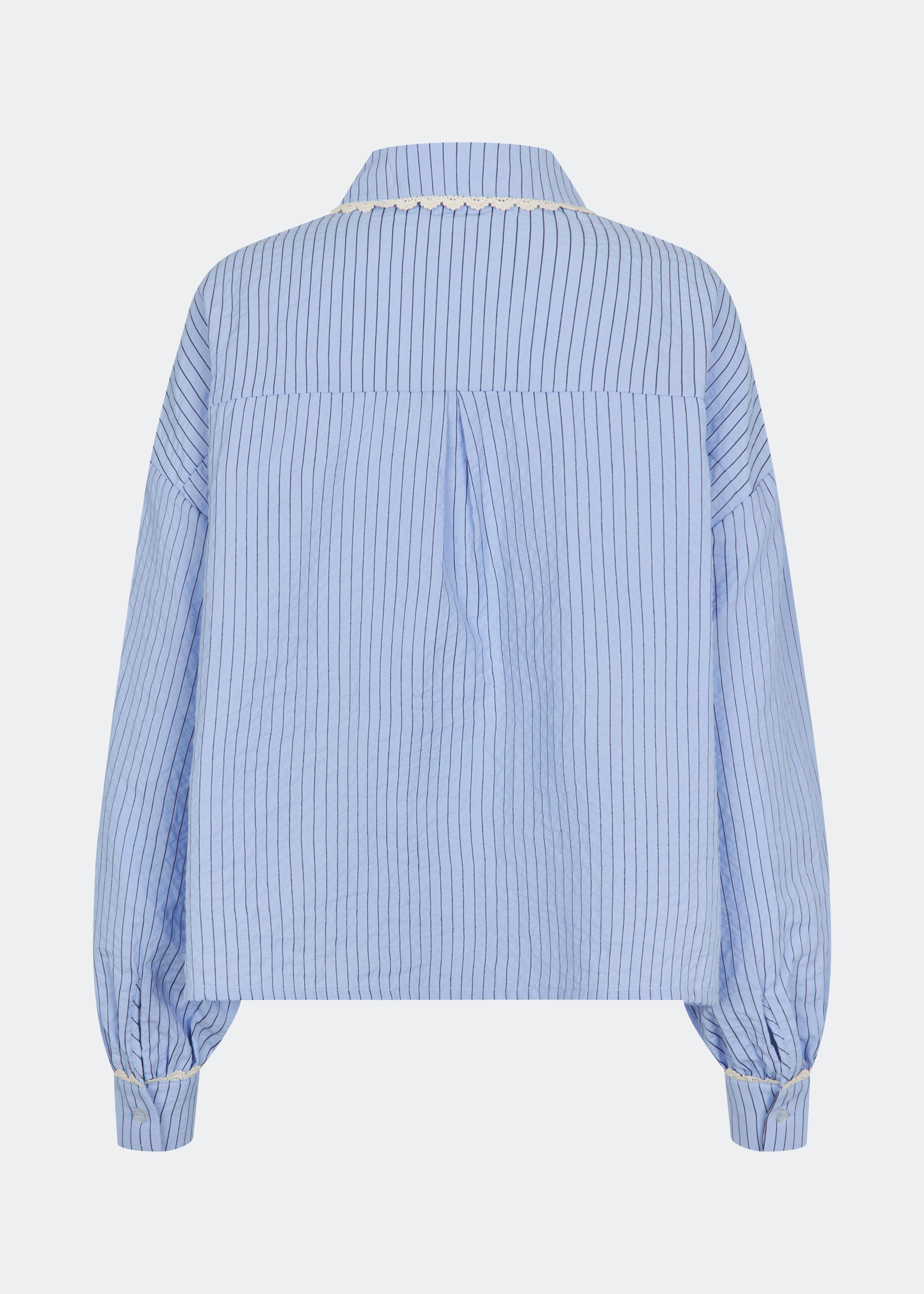 DanjaMD Shirt is a striped shirt with a relaxed fit and long sleeves. The design features a classic shirt collar with decorative lace trim, a button-down front and two chest pockets. Lace trims at the cuffs add a feminine contrast to the classic striped look. Style it with jeans or tailored trousers for an everyday look. The model is 175 cm tall and is wearing a size S/36.