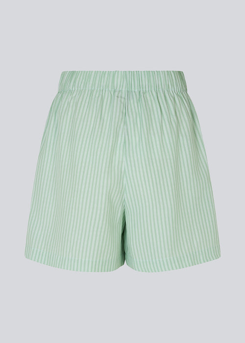 Striped shorts in a cotton blend material with a relaxed shape, wide legs, and an elasticated waist. DannyMD shorts feature a small embroidered logo in front. The model is 177 cm and wears a size S/36.  Shop matching shirt: DannyMD shirt.