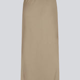 Upgrade your wardrobe with the DarrelMD Long Skirt in Light Brown Linen Blend. This elegant skirt features an elastic waist for a comfortable fit and a relaxed silhouette. Perfect for everyday wear or special occasions, this light brown skirt combines style and comfort effortlessly.