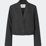 DeanneMD Blazer is a cropped blazer with a relaxed, modern silhouette. The blazer features classic lapels, long sleeves, two front buttons and an elasticated hem that adds a casual touch to the tailored design. Style it with matching trousers for a complete suit look or pair it with jeans for a more relaxed outfit. The model is 175 cm tall and is wearing a size S/36.