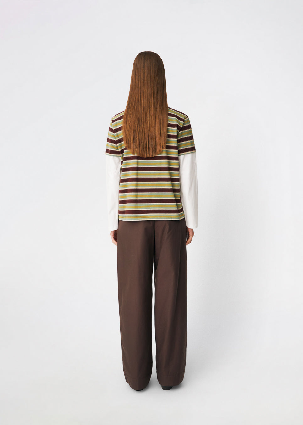 The Denismd Contrast Tee is a layered-look T-shirt combining a striped rib fabric with contrasting long sleeves for a relaxed, modern aesthetic. Designed with a loose fit, classic crew neckline, and an embroidered Modström logo at the chest for a sporty finish. Pair it with jeans, cargo trousers, or tailored pants for an effortless everyday look.