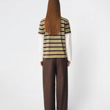 The Denismd Contrast Tee is a layered-look T-shirt combining a striped rib fabric with contrasting long sleeves for a relaxed, modern aesthetic. Designed with a loose fit, classic crew neckline, and an embroidered Modström logo at the chest for a sporty finish. Pair it with jeans, cargo trousers, or tailored pants for an effortless everyday look.
