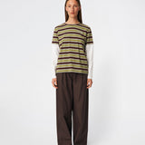 The Denismd Contrast Tee is a layered-look T-shirt combining a striped rib fabric with contrasting long sleeves for a relaxed, modern aesthetic. Designed with a loose fit, classic crew neckline, and an embroidered Modström logo at the chest for a sporty finish. Pair it with jeans, cargo trousers, or tailored pants for an effortless everyday look.