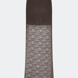Dianamd Skirt is an elegant maxi skirt with a fitted silhouette through the hips, flowing into a sheer lace design from the knees down. The long, streamlined shape creates a feminine silhouette, while the semi-sheer finish adds a light and sophisticated touch. Style it with a simple T-shirt for an effortless everyday look or pair it with an elegant top for special occasions. The model is 175 cm tall and is wearing a size S/36.