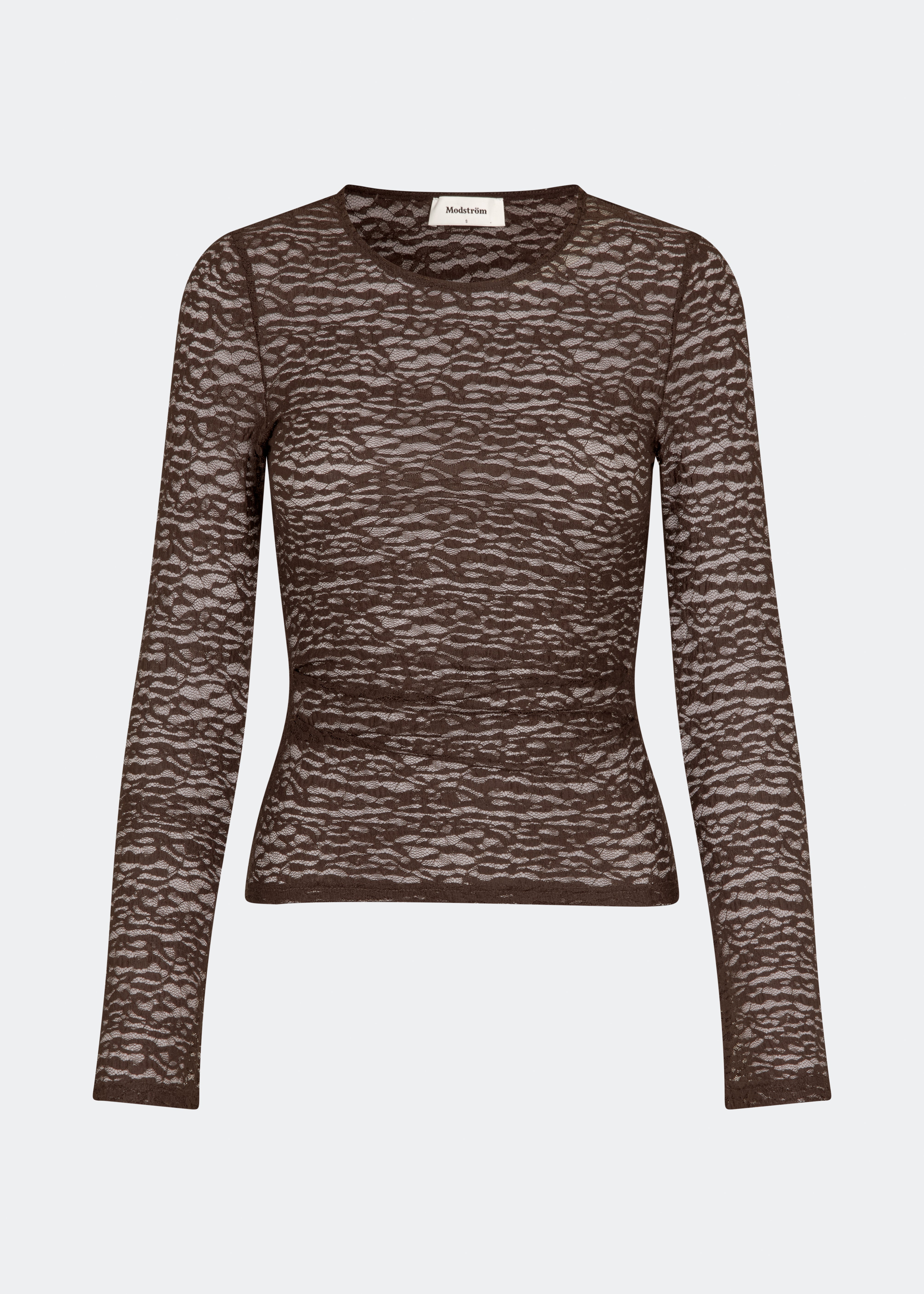 Dianamd Top is a fitted lace top with long sleeves and a sheer finish that adds a feminine and modern touch to your wardrobe. The clean silhouette makes it easy to wear on its own or layered under blazers, knitwear or dresses, allowing the delicate lace to stand out. Perfect for both everyday styling and special occasions. The model is 175 cm tall and is wearing a size S/36.