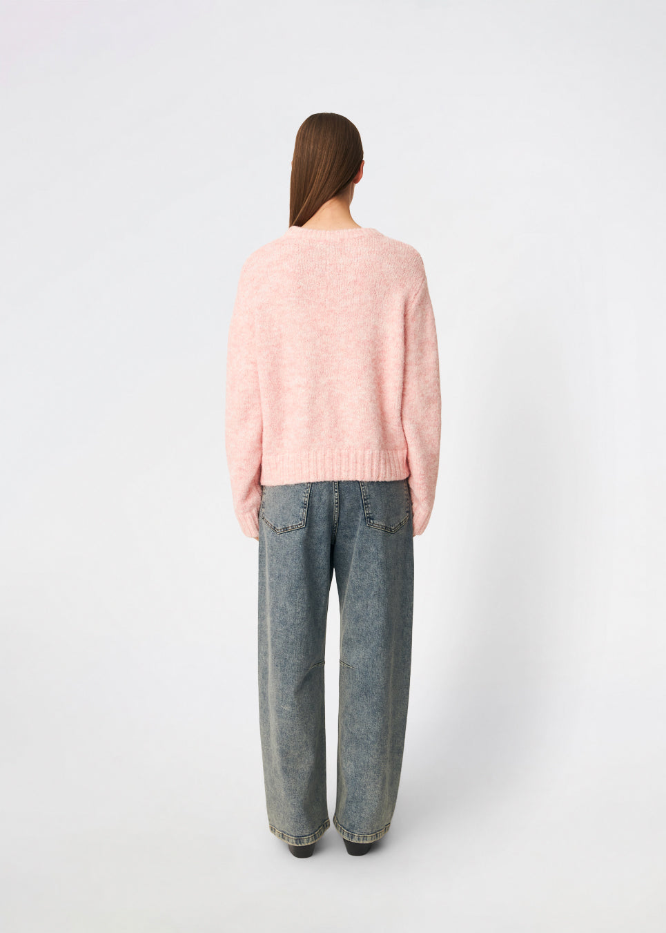 The Dictemd O-Neck is a soft melange knit sweater with a classic crew neckline and a relaxed fit. Finished with ribbed trims at the neck, cuffs and hem, it offers a timeless look that's easy to wear. A versatile everyday knit that pairs effortlessly with jeans, tailored trousers or skirts throughout the season.