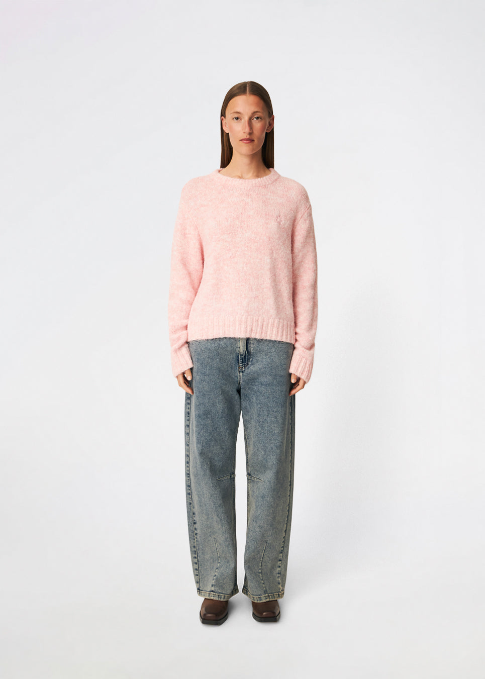 The Dictemd O-Neck is a soft melange knit sweater with a classic crew neckline and a relaxed fit. Finished with ribbed trims at the neck, cuffs and hem, it offers a timeless look that's easy to wear. A versatile everyday knit that pairs effortlessly with jeans, tailored trousers or skirts throughout the season.