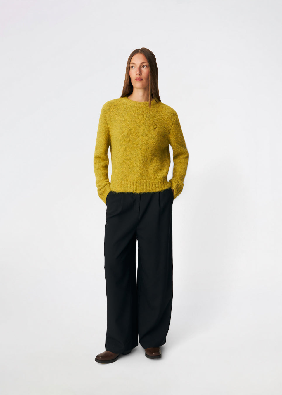 The Dictemd O-Neck is a soft melange knit sweater with a classic crew neckline and a relaxed fit. Finished with ribbed trims at the neck, cuffs and hem, it offers a timeless look that's easy to wear. A versatile everyday knit that pairs effortlessly with jeans, tailored trousers or skirts throughout the season.