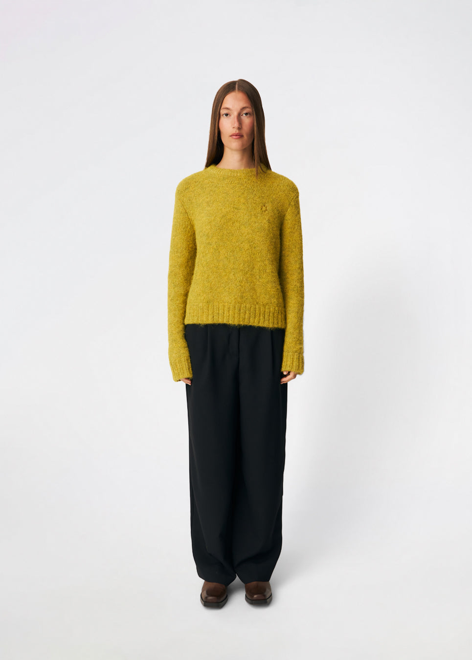 The Dictemd O-Neck is a soft melange knit sweater with a classic crew neckline and a relaxed fit. Finished with ribbed trims at the neck, cuffs and hem, it offers a timeless look that's easy to wear. A versatile everyday knit that pairs effortlessly with jeans, tailored trousers or skirts throughout the season.