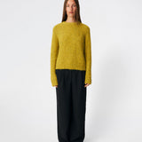 The Dictemd O-Neck is a soft melange knit sweater with a classic crew neckline and a relaxed fit. Finished with ribbed trims at the neck, cuffs and hem, it offers a timeless look that's easy to wear. A versatile everyday knit that pairs effortlessly with jeans, tailored trousers or skirts throughout the season.