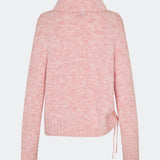 The Dictemd Rollneck is a soft knit sweater featuring a high roll neck and a relaxed fit. Ribbed trims and a subtle side slit add a modern touch, while the melange knit provides warmth and texture. A versatile wardrobe staple, perfect worn on its own or layered under seasonal jackets and coats.