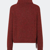 The Dictemd Rollneck is a soft knit sweater featuring a high roll neck and a relaxed fit. Ribbed trims and a subtle side slit add a modern touch, while the melange knit provides warmth and texture. A versatile wardrobe staple, perfect worn on its own or layered under seasonal jackets and coats.