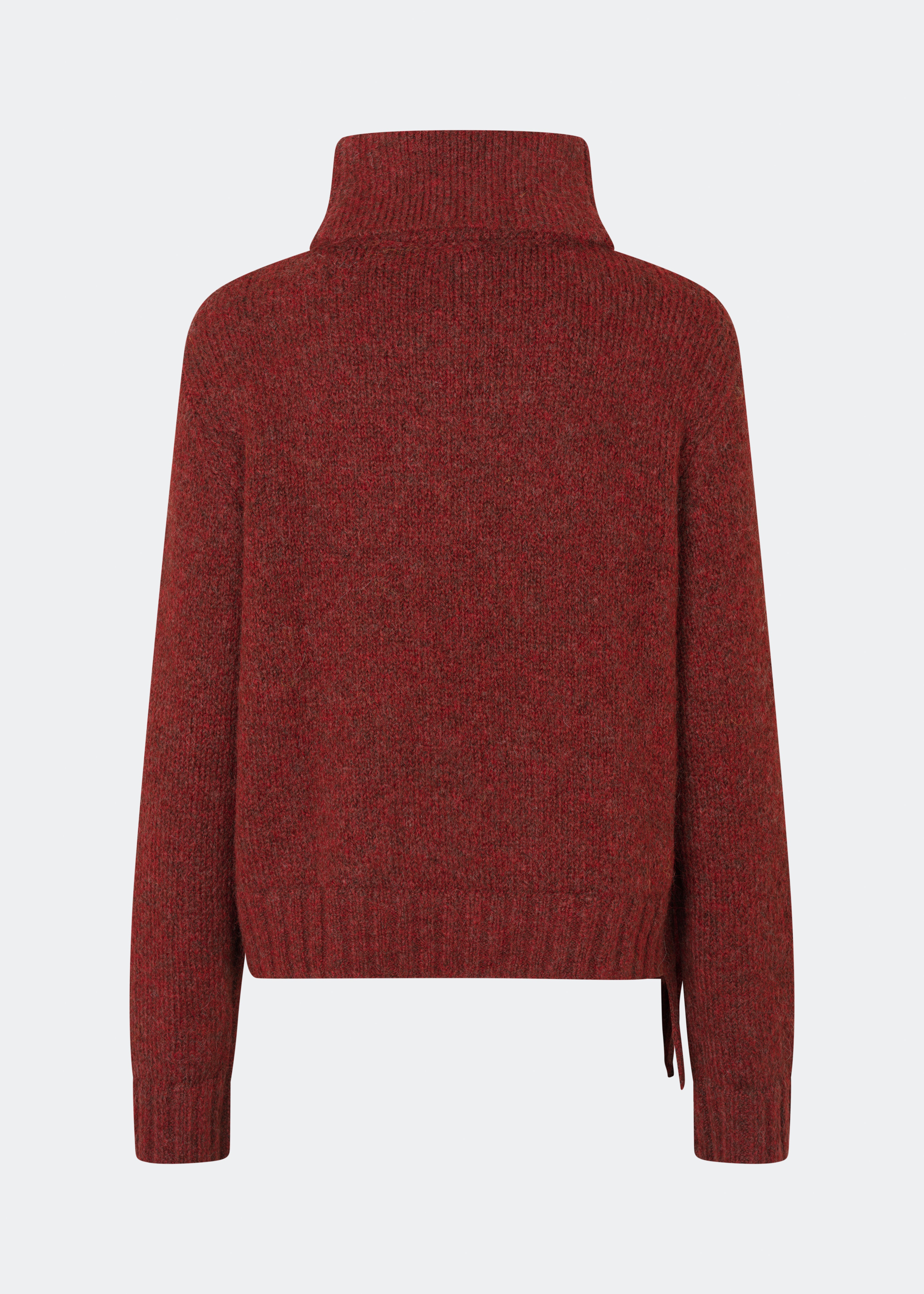 The Dictemd Rollneck is a soft knit sweater featuring a high roll neck and a relaxed fit. Ribbed trims and a subtle side slit add a modern touch, while the melange knit provides warmth and texture. A versatile wardrobe staple, perfect worn on its own or layered under seasonal jackets and coats.