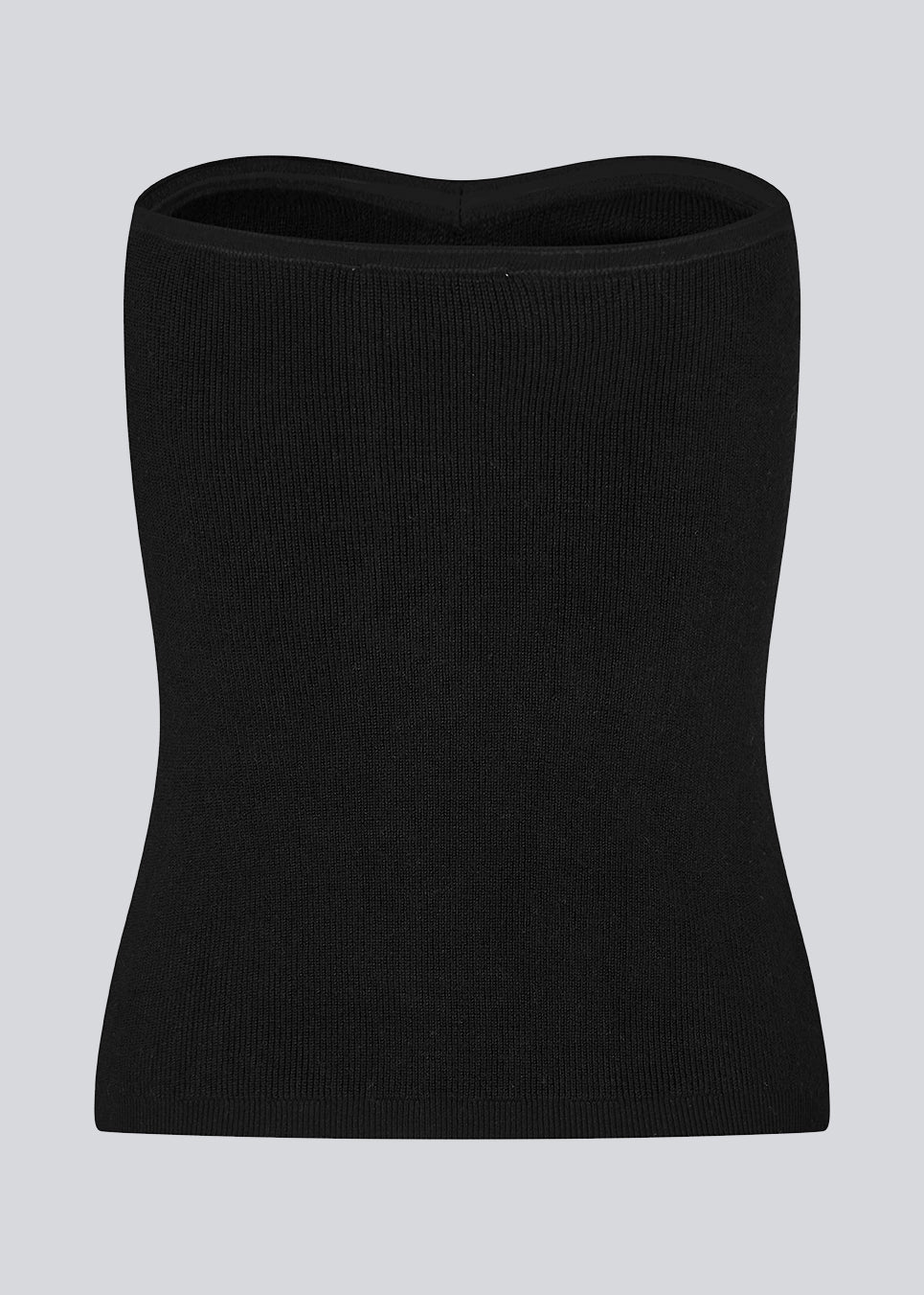 Black tube top with fitted shape and sweetheart neckline. DiegoMD top is made from a soft, ribbed knit with a silicone band on the inside of the neckline. The model is 177 cm and wears a size S/36.