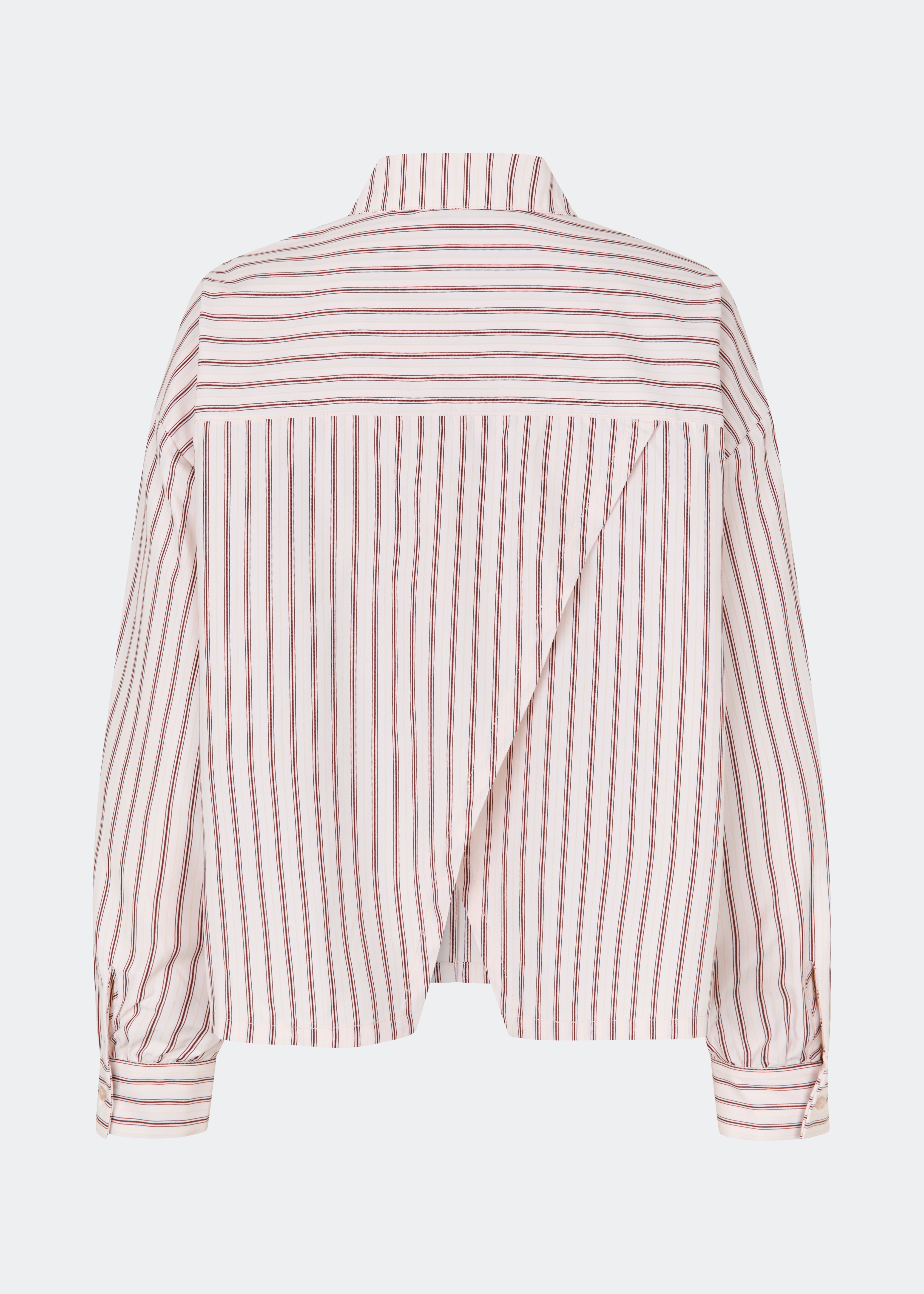 The Dilanmd Stripe Shirt is a classic striped shirt with a relaxed oversized fit. Designed with a traditional collar, button closure, and wide cuffs, it is finished with a distinctive overlapping back slit that adds a modern twist. A versatile wardrobe staple that can be worn on its own or layered effortlessly over everyday essentials.