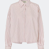 The Dilanmd Stripe Shirt is a classic striped shirt with a relaxed oversized fit. Designed with a traditional collar, button closure, and wide cuffs, it is finished with a distinctive overlapping back slit that adds a modern twist. A versatile wardrobe staple that can be worn on its own or layered effortlessly over everyday essentials.